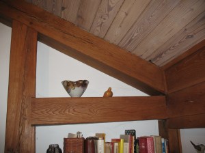 Diagonal bracing using a housed pegged mortise and tenon at one end and a half lap with a through tenon at the corner.