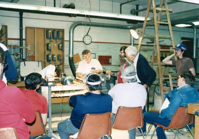 Here's a picture of me (in red) watching Rude Osolnik turn at a workshop at NCSU in the early 80's.