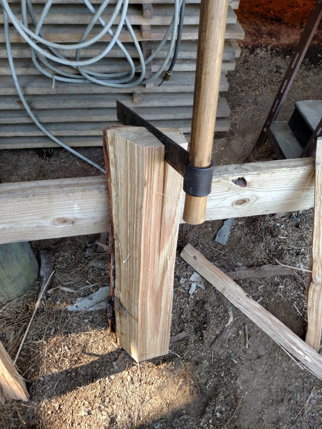 Riving spindles with a froe